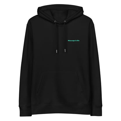 Sweat à capuche noir bio avec inscription 'Massage is life' en vert clair, style lifestyle bien-être.